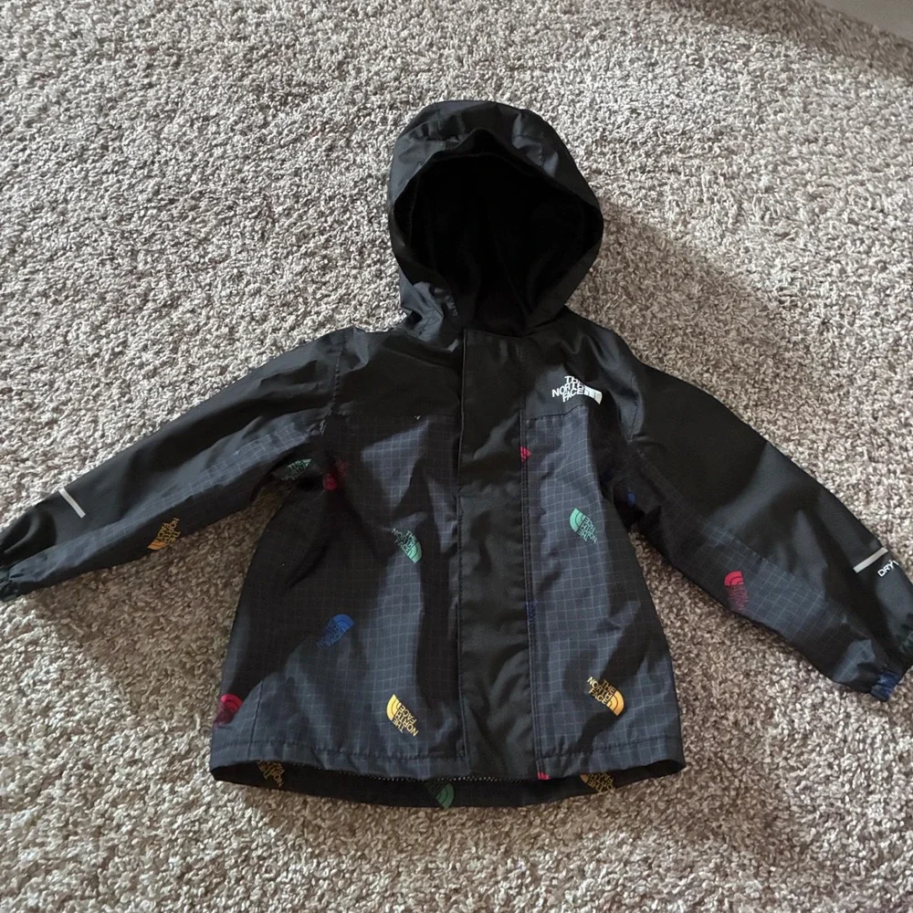 The North Face Baby DryVent Rain Jacket Black Multi Logo Grid Hooded 6-12M